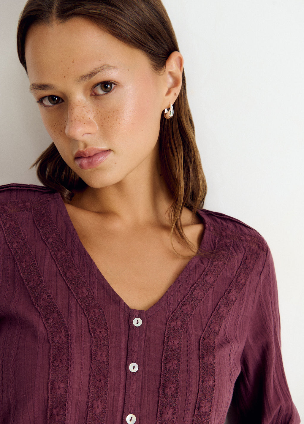 Long-sleeved ruffle blouse