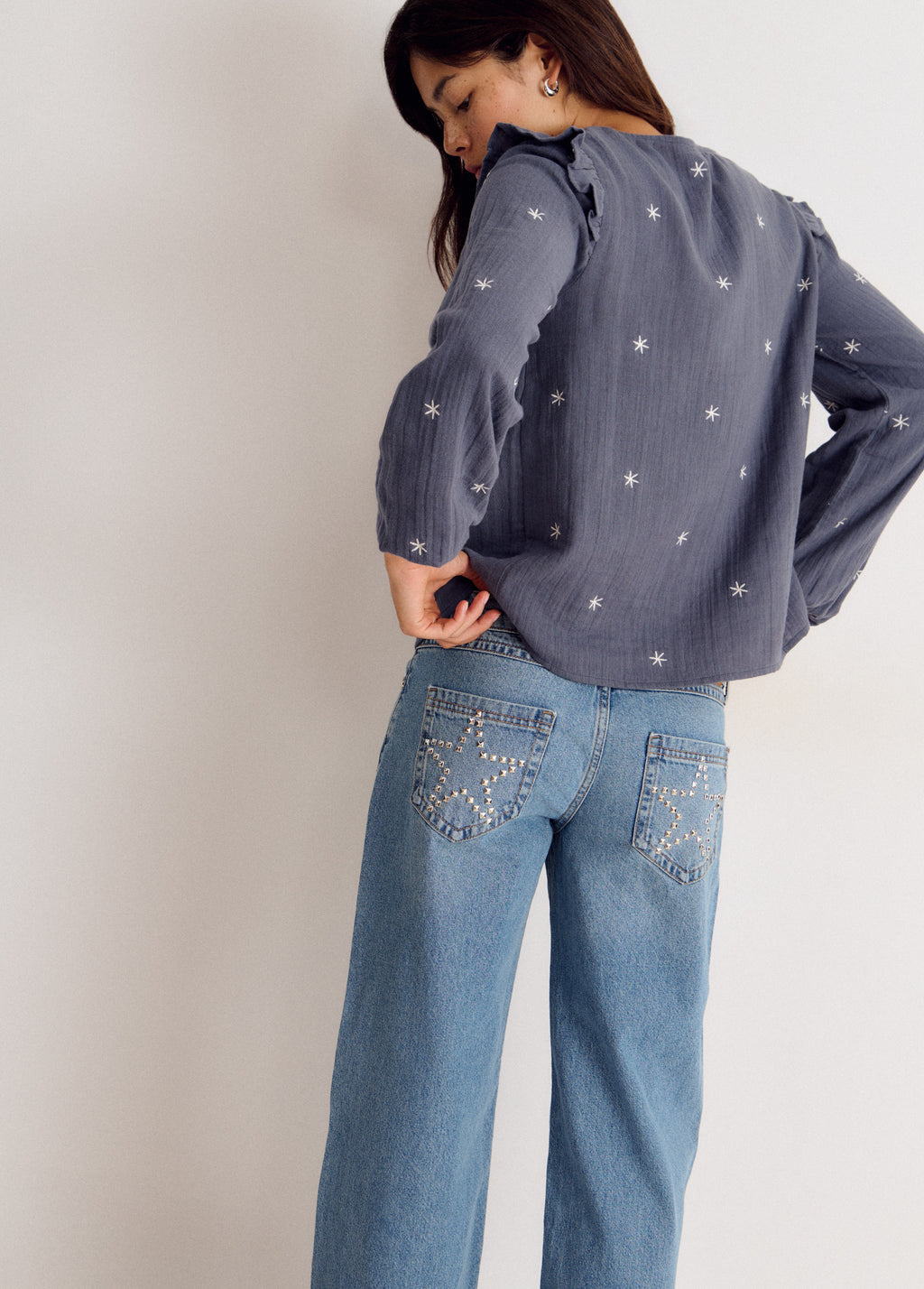 Blusa manga larga dobby escote pico