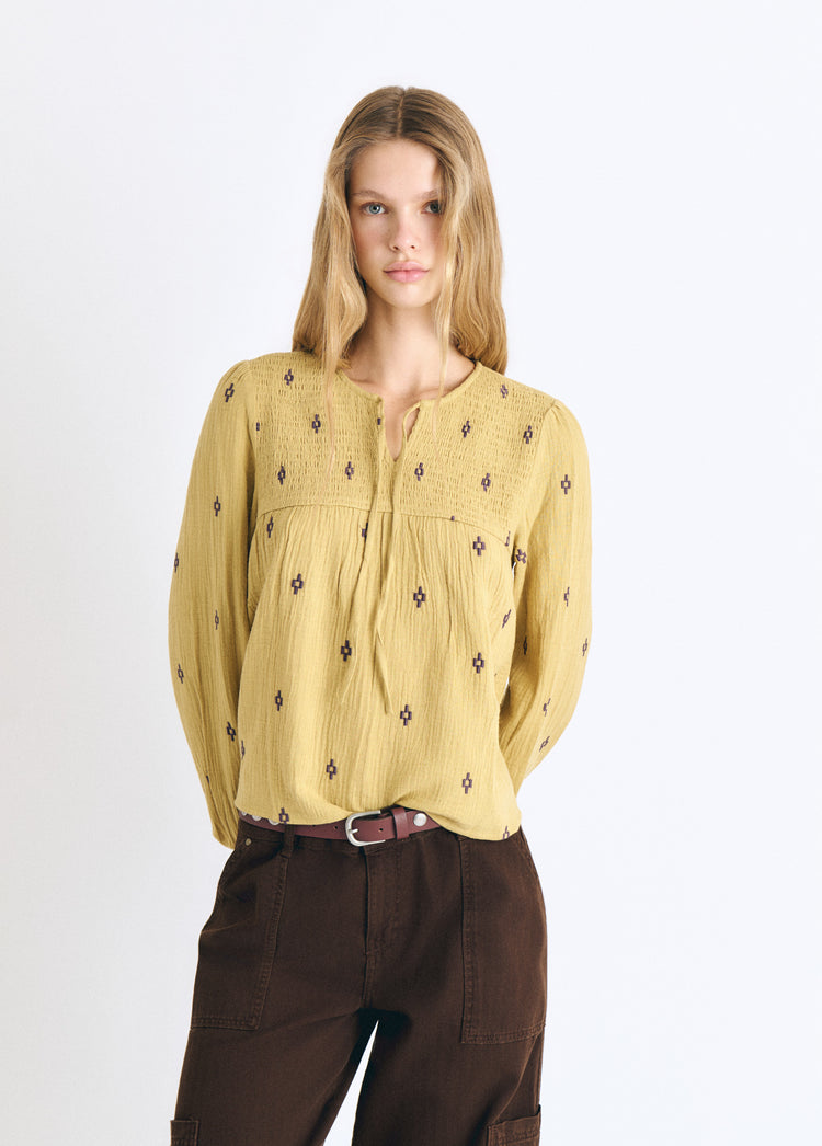 Embroidered smocked blouse
