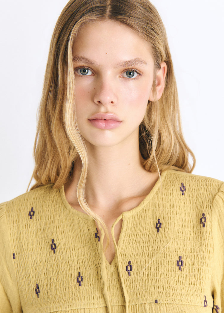 Embroidered smocked blouse