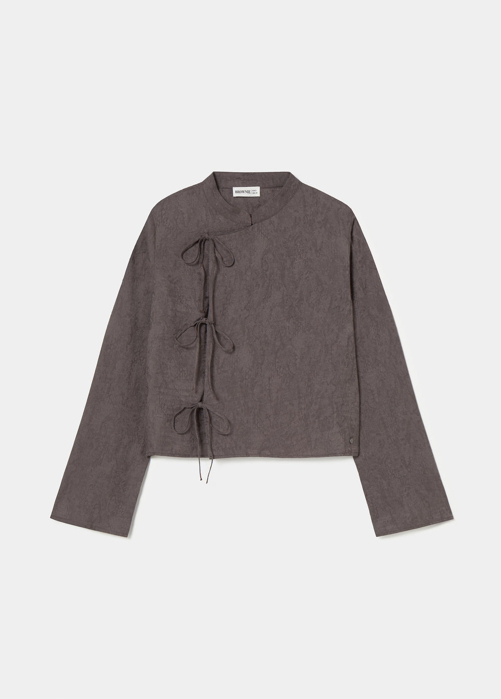Blouse jacquard avec détail de nœuds
