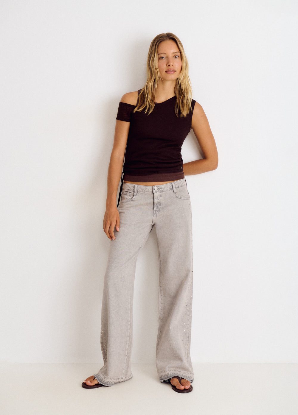 Jeans with side studs