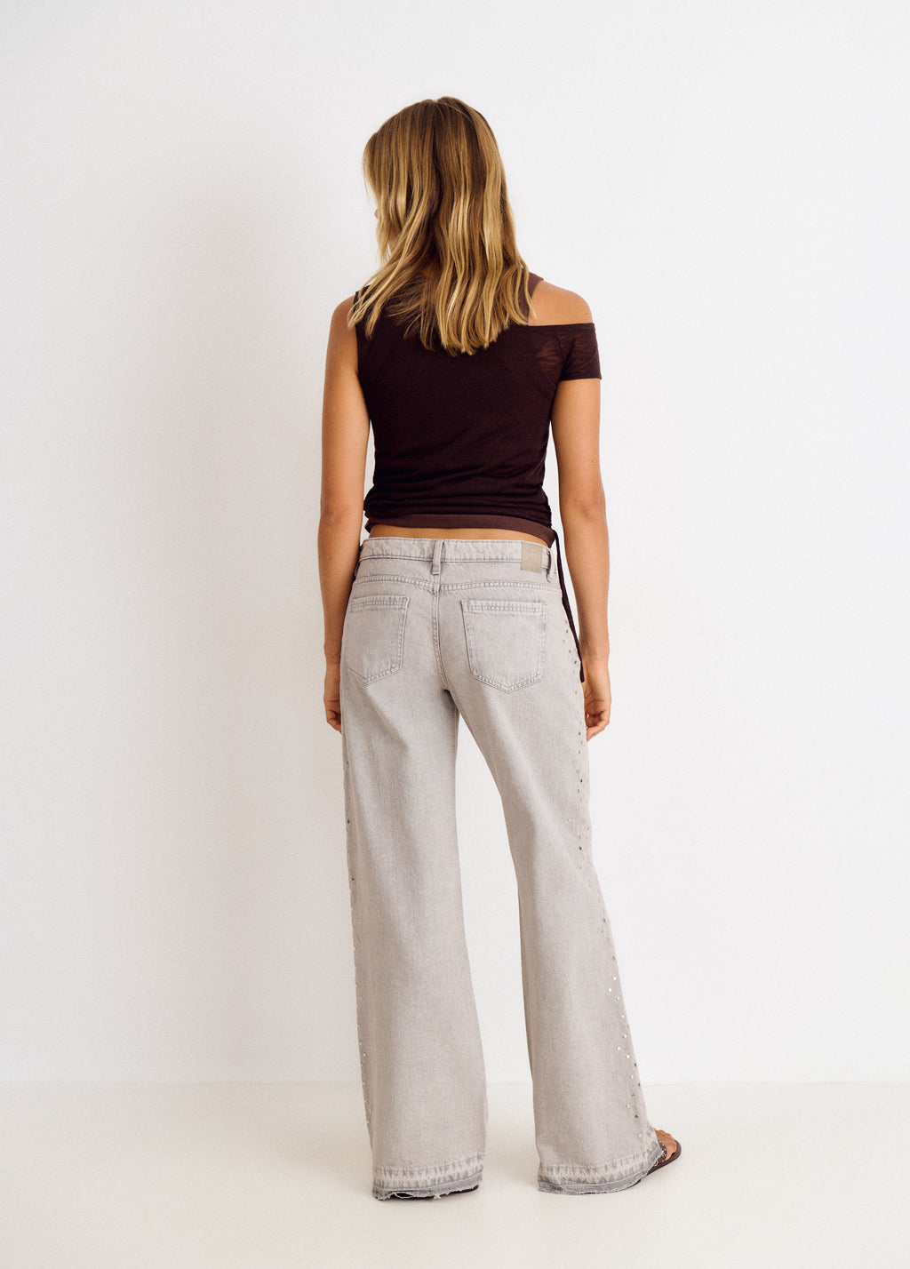 Jeans with side studs