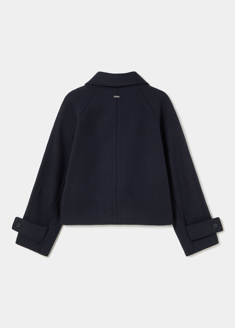 Short coat with toggle fastenings