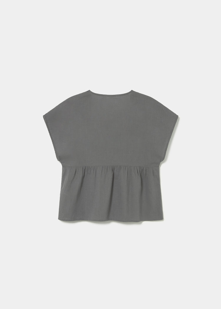 Blouse with embroidered neckline