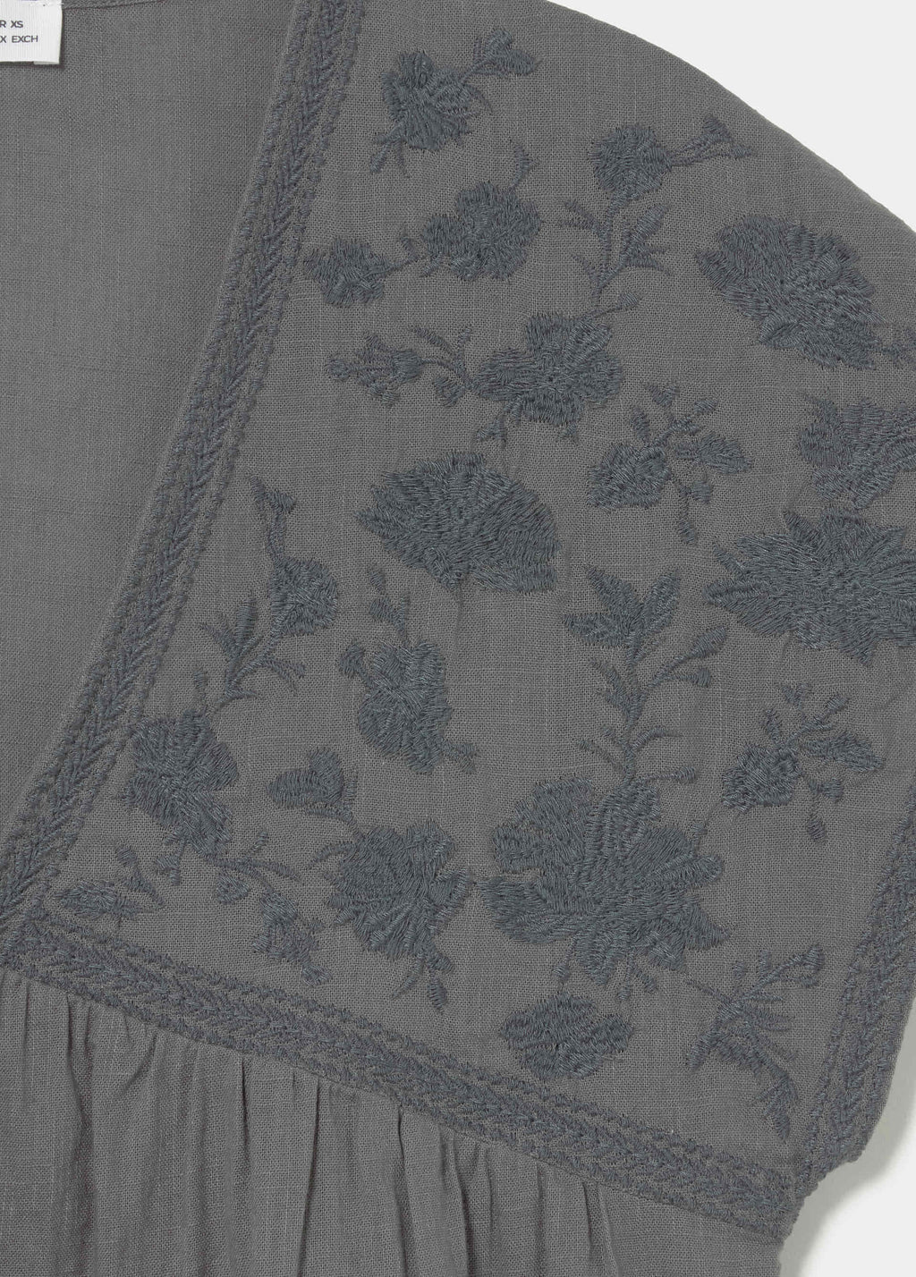 Blouse with embroidered neckline