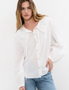 Embroidered blouse with bow