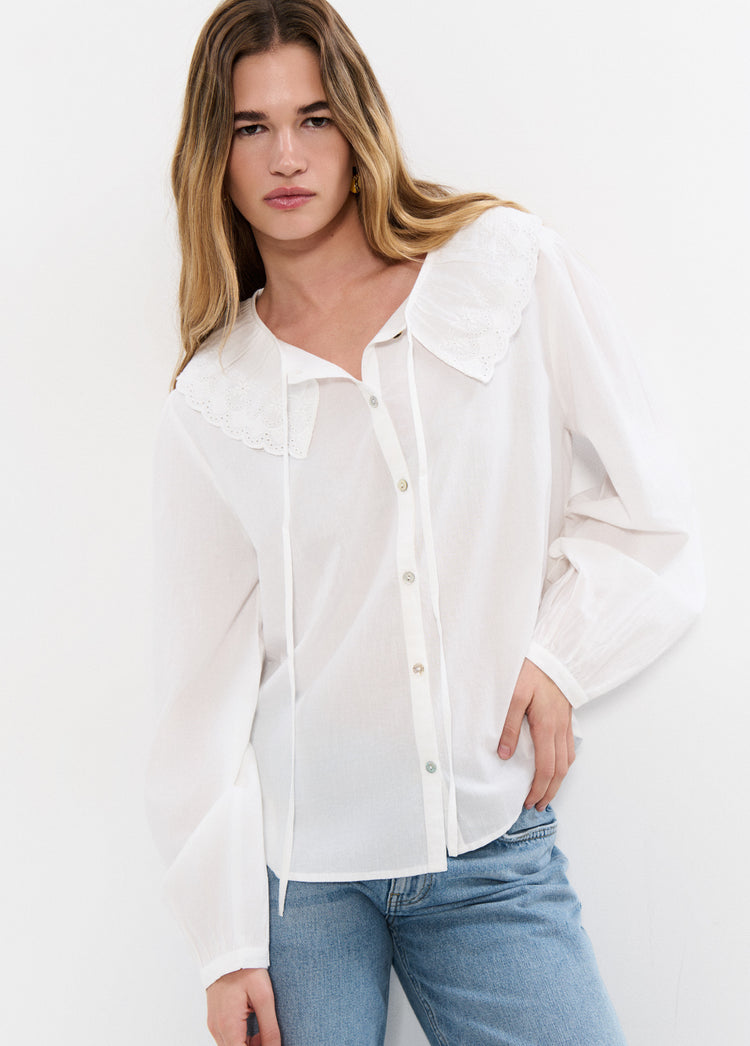 Embroidered blouse with bow