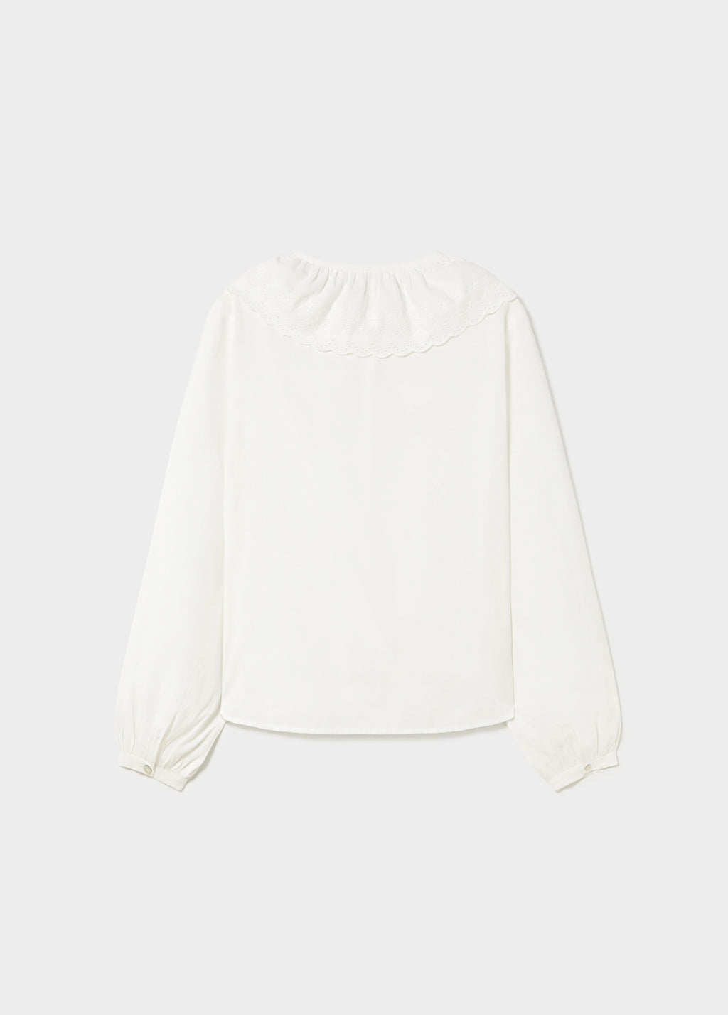Embroidered blouse with bow