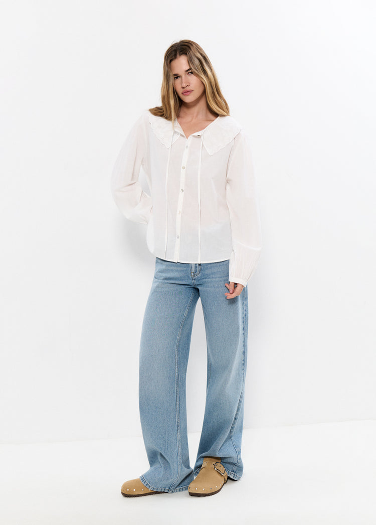 Embroidered blouse with bow