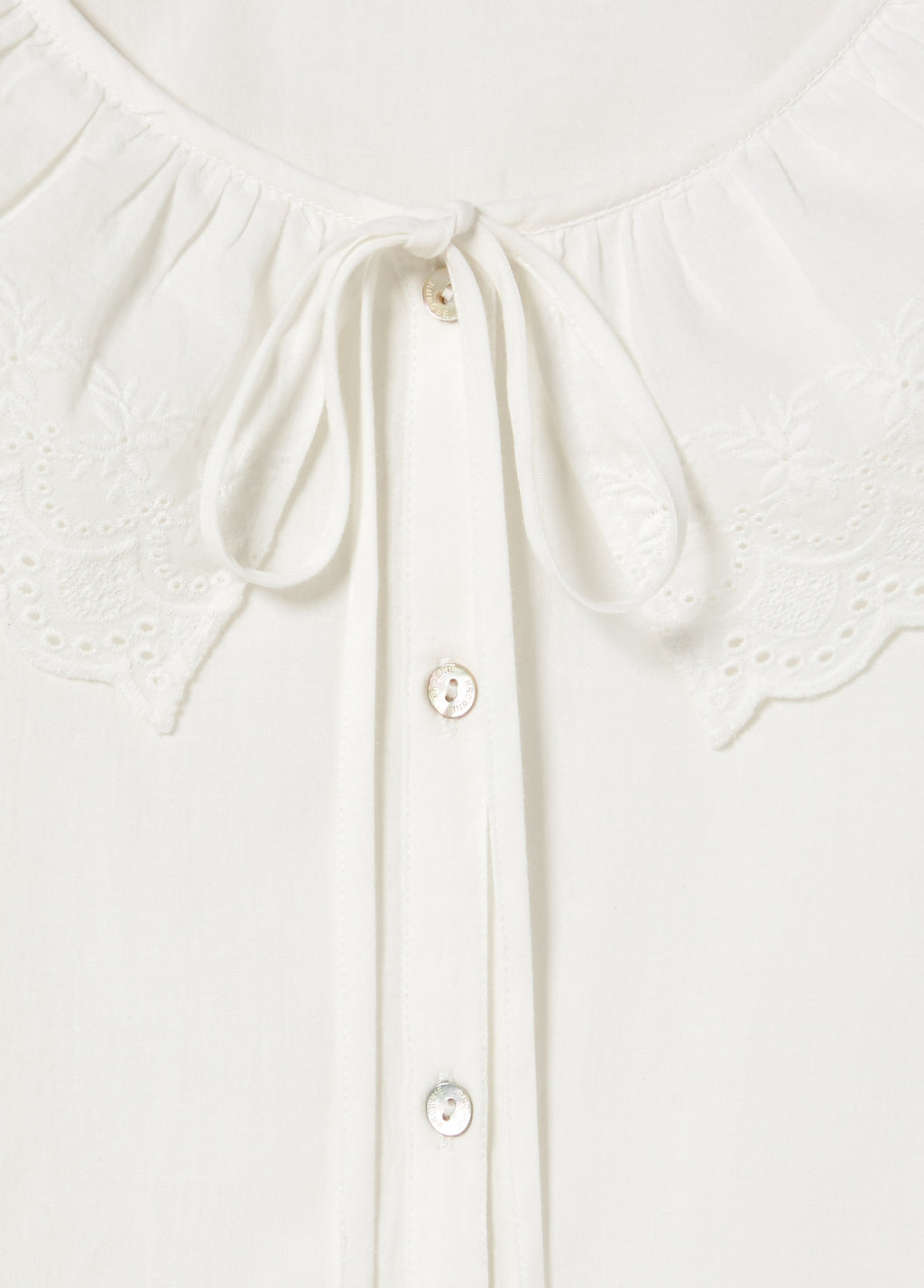Embroidered blouse with bow
