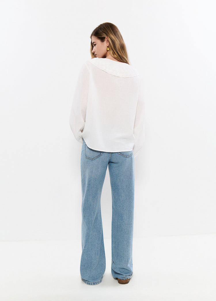 Embroidered blouse with bow
