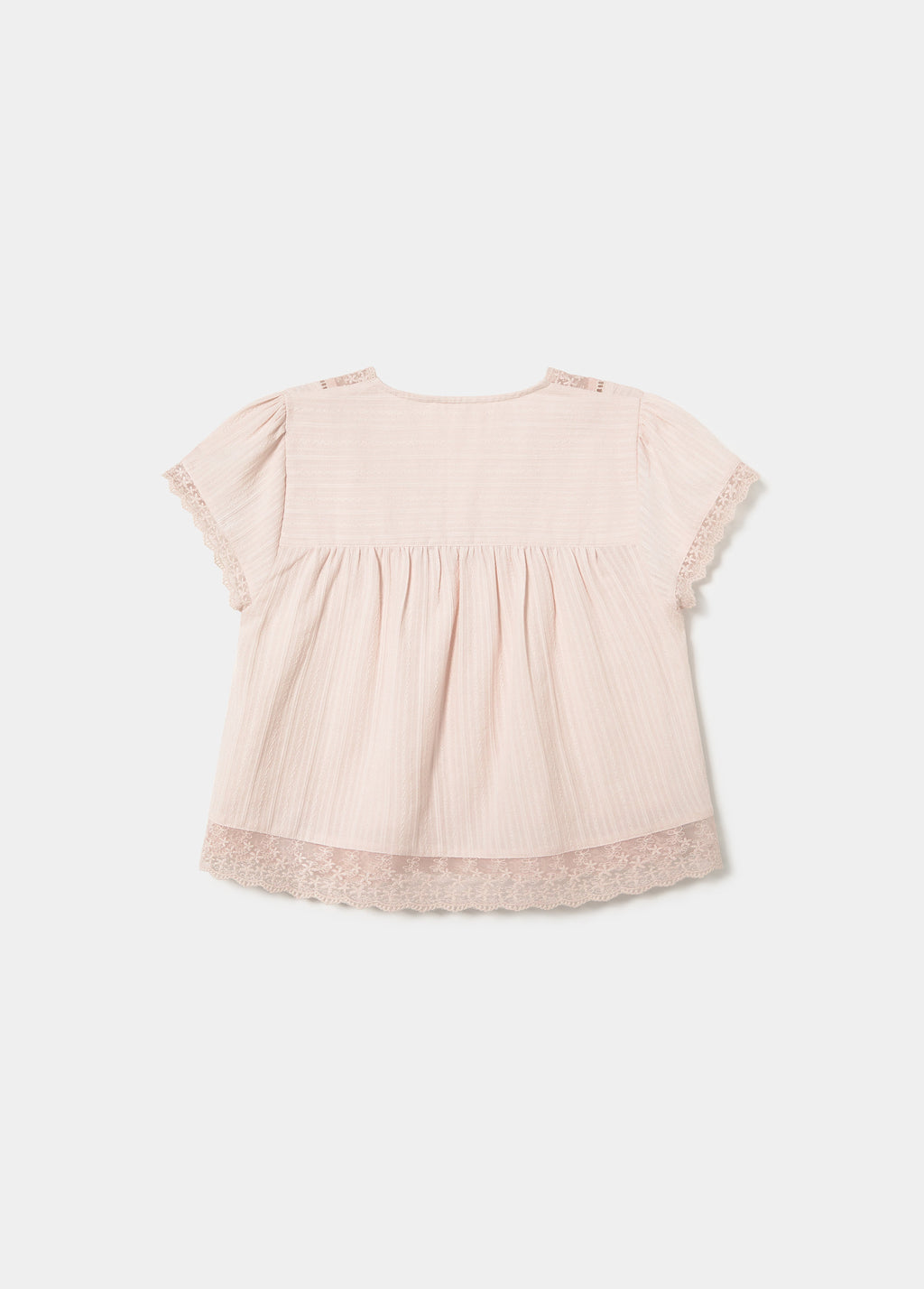 Blouse en dentelle semi-transparente