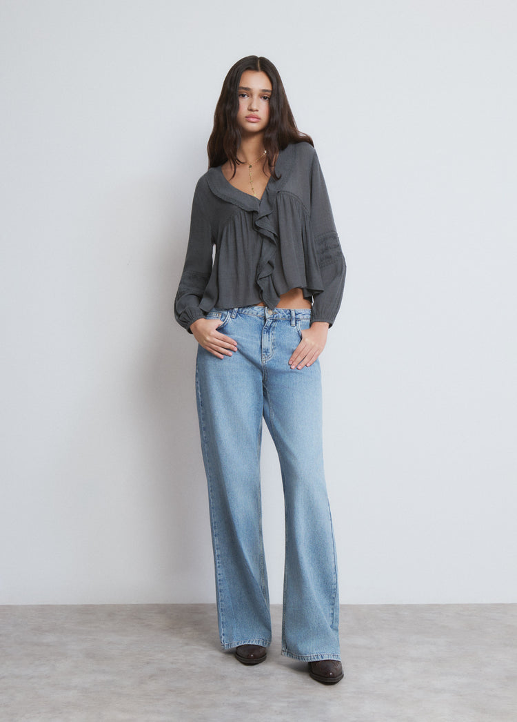 Blusa amb volants