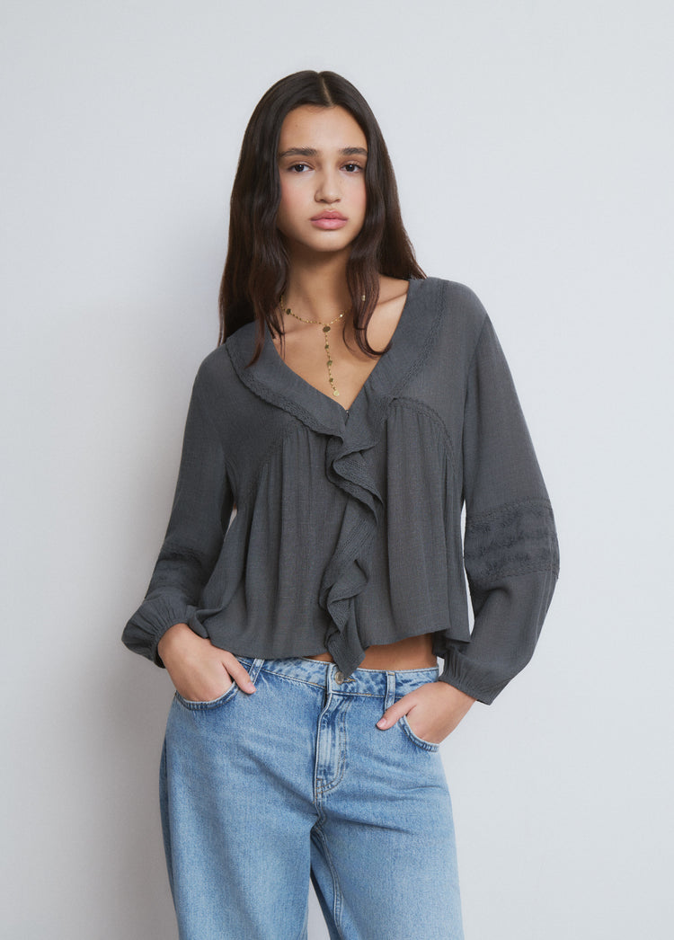 Blusa amb volants