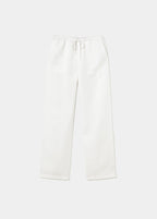 Pantalón de lino blanco con bolsillos laterales sobre modelo en vista frontal de cintura a pies