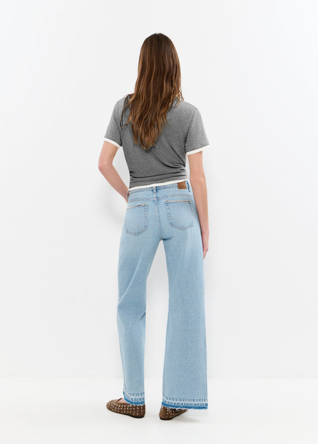 Relaxed jeans with studs and folded hem
