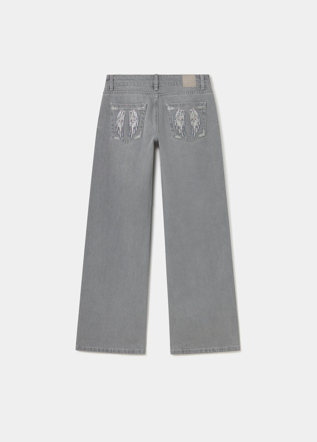 Jean taille basse avec ailes brodées et clous