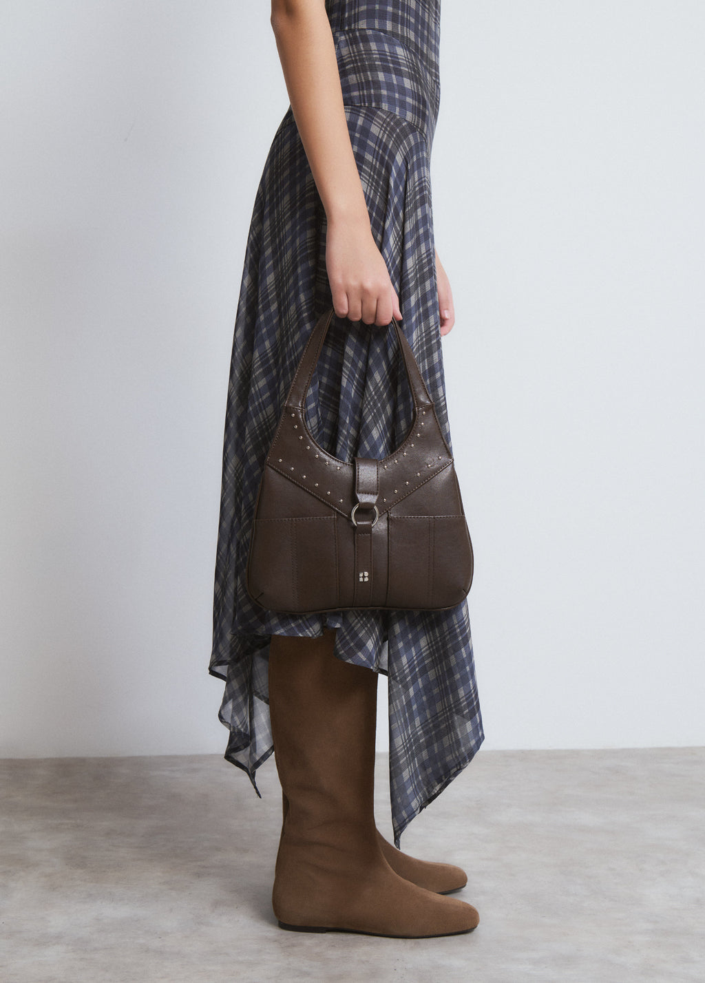 Shoulder bag with studded buckle