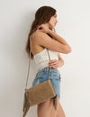 Leather flap bag with fringes