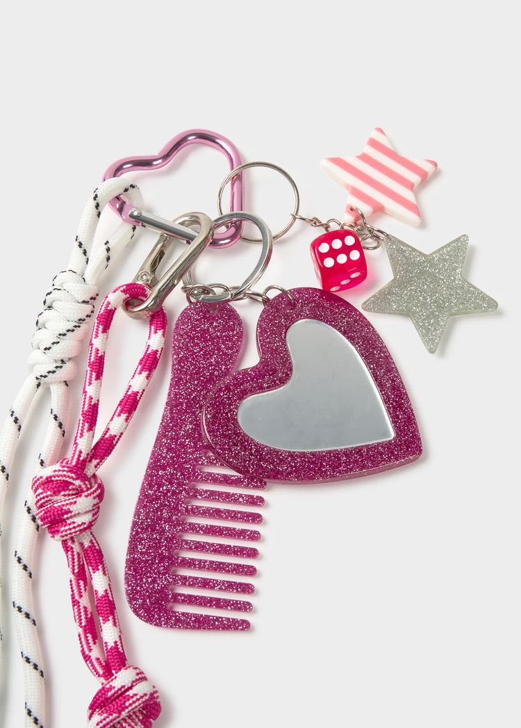 Comb and mirror charm