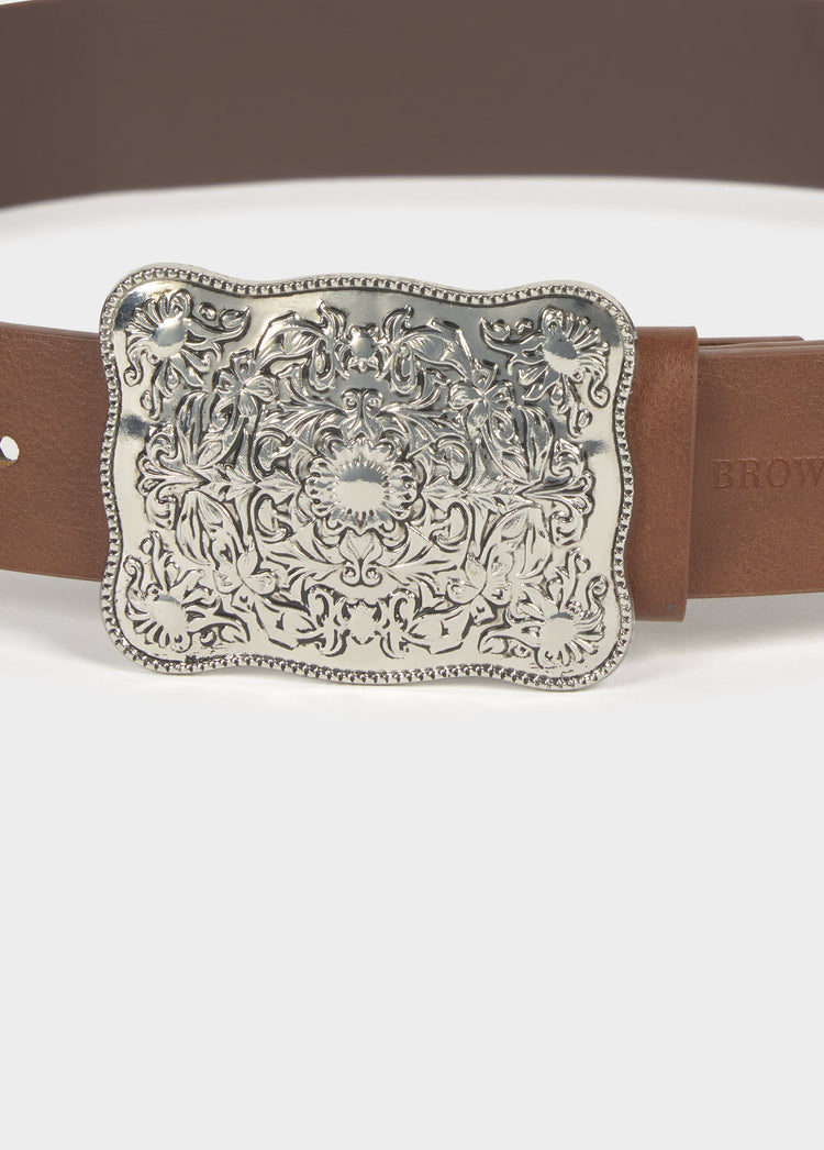 Belt with metal piece