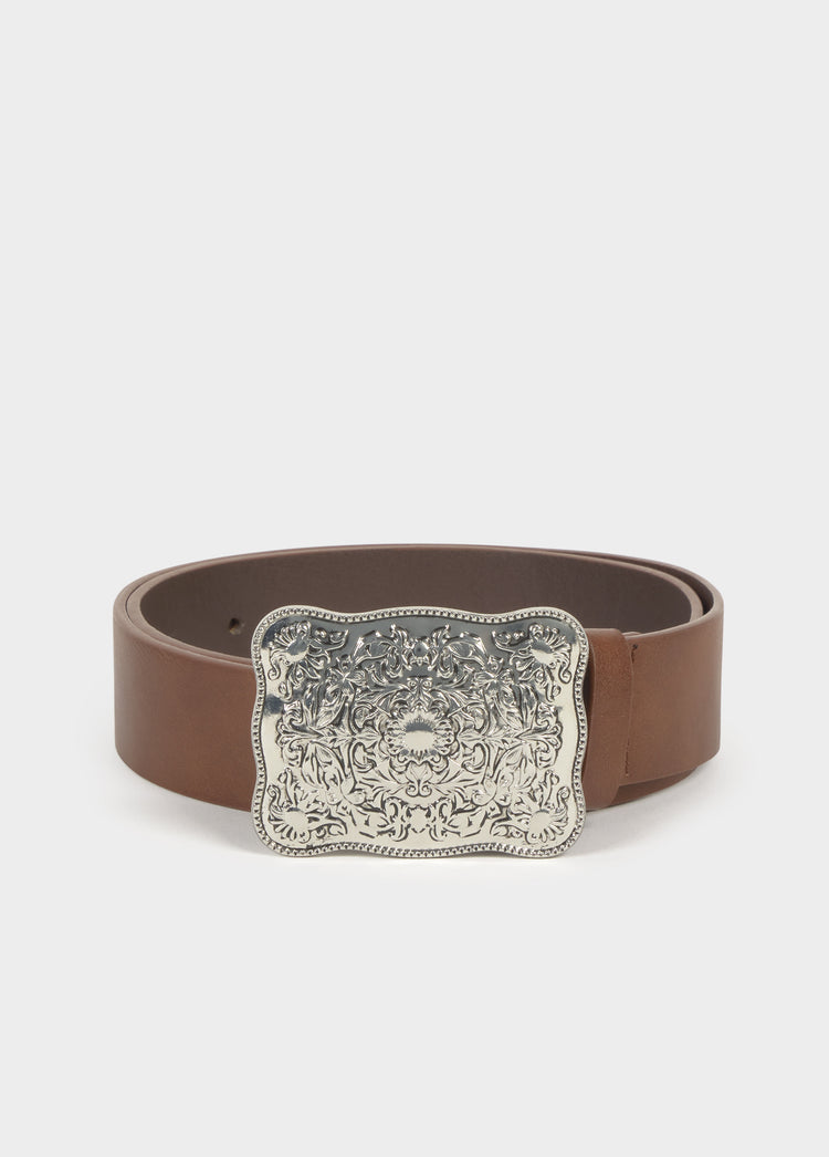 Belt with metal piece