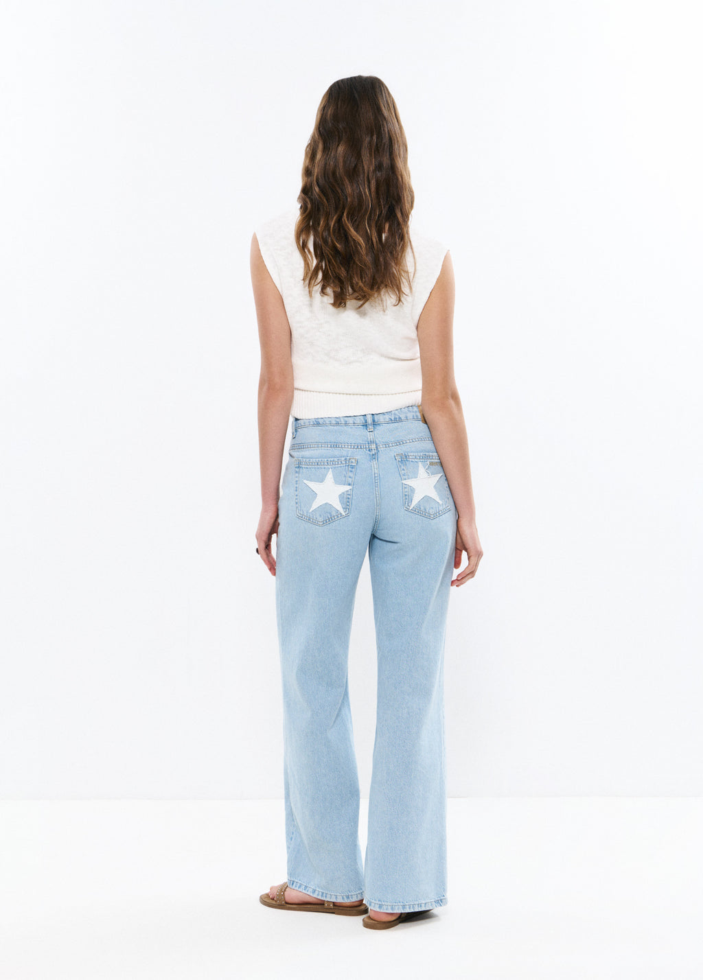 Jeans 5 tasche con patch a stella
