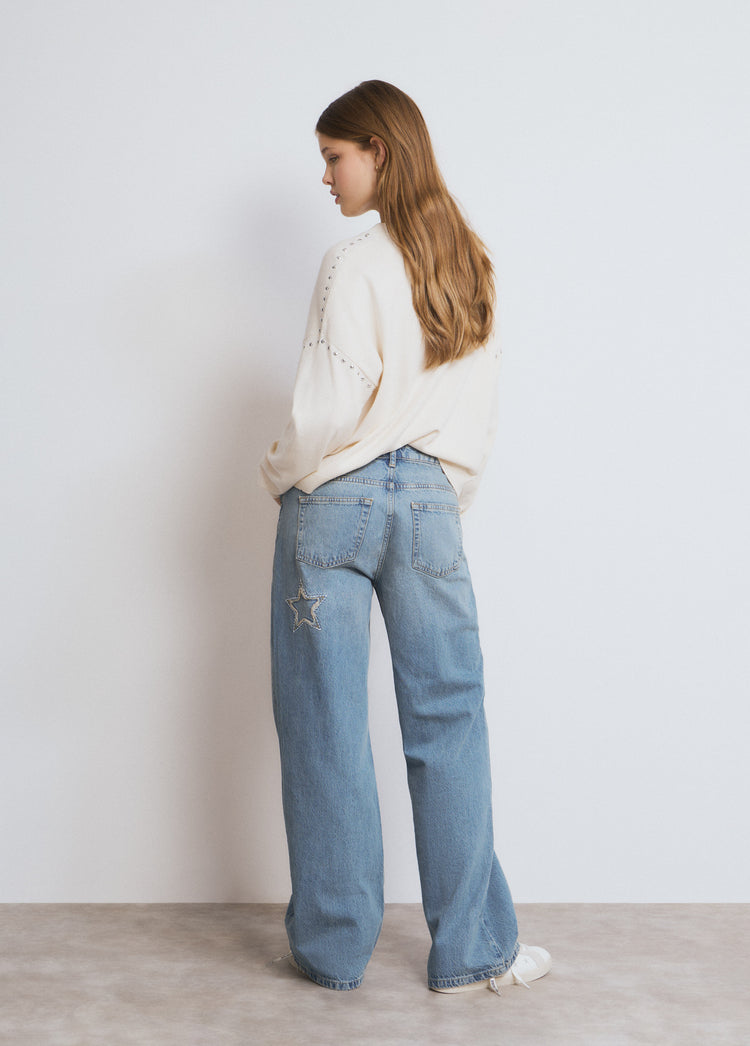 Jeans met sterpatch en rafels