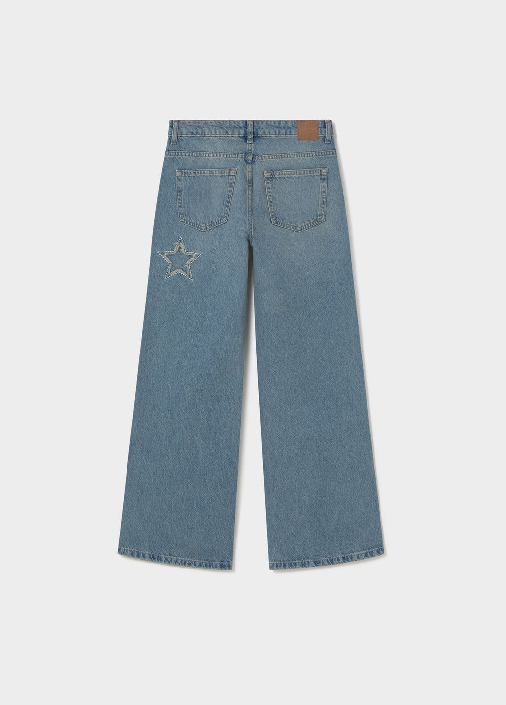 Jeans met sterpatch en rafels
