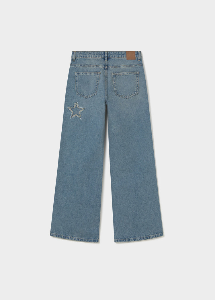 Jeans met sterpatch en rafels