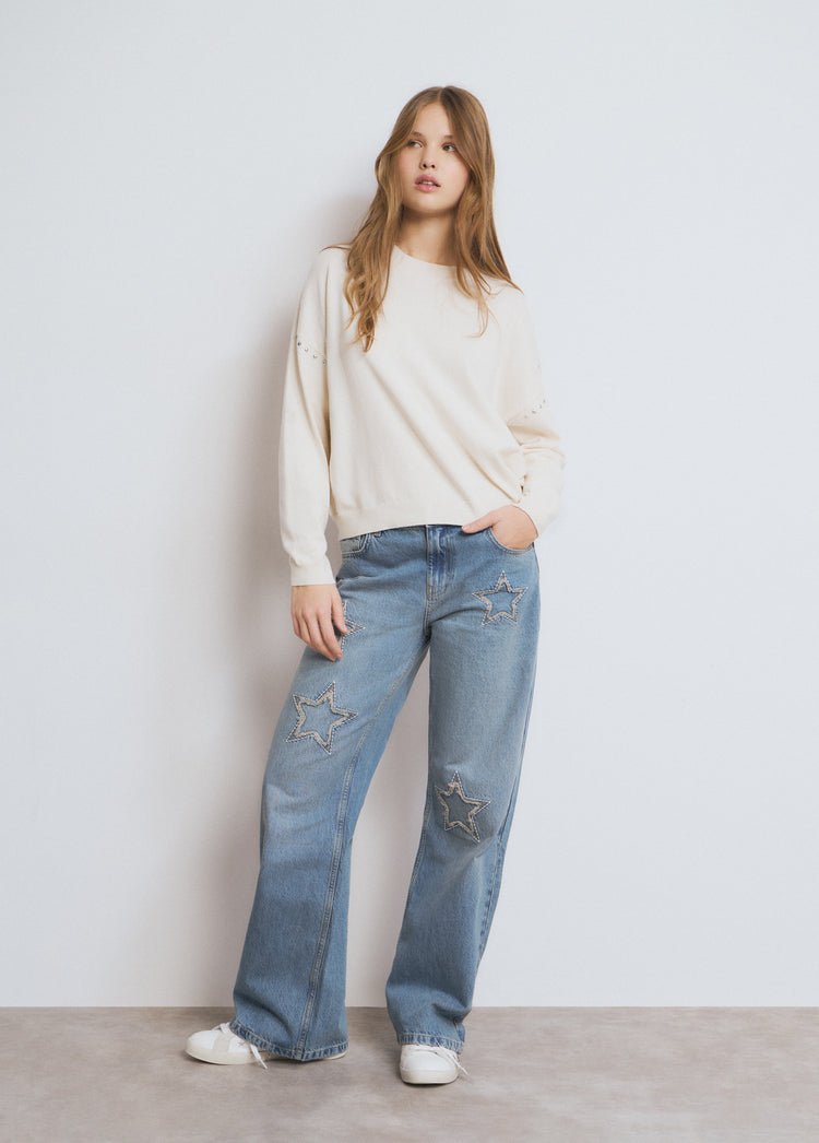 Jeans met sterpatch en rafels