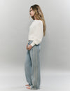 Jeans with side cross stitch panel