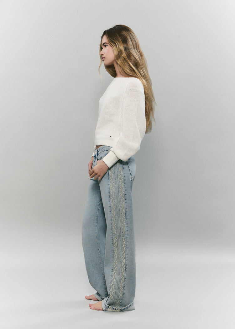 Jeans with side cross stitch panel
