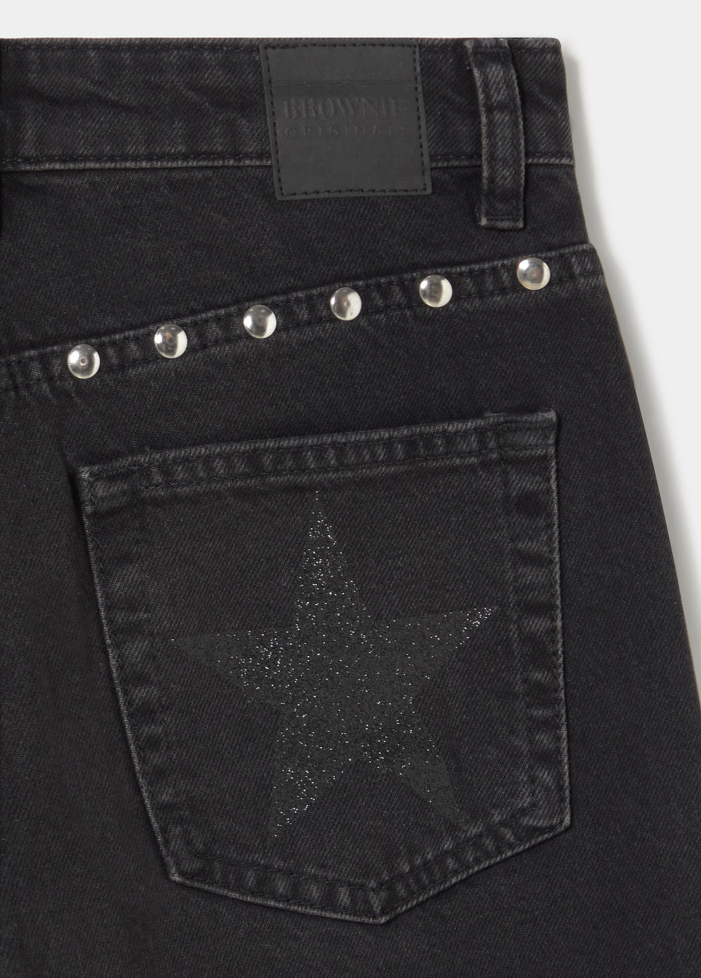 Jeans con borchie a stelle