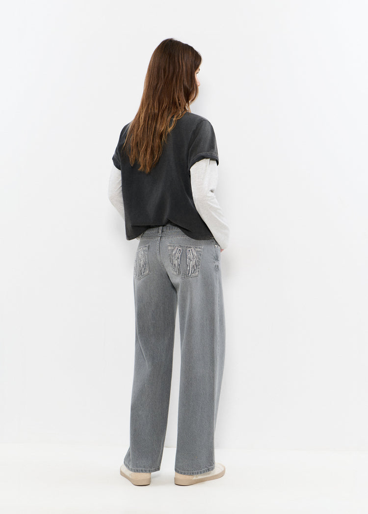 Jeans met lage taille, geborduurde vleugels en studs