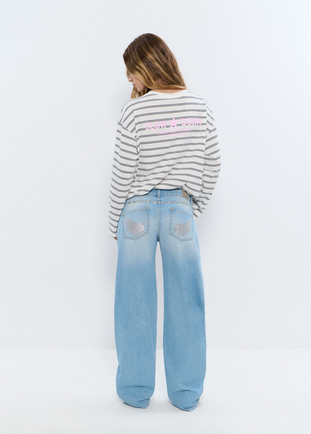 Jeans tiro bajo alas glitter
