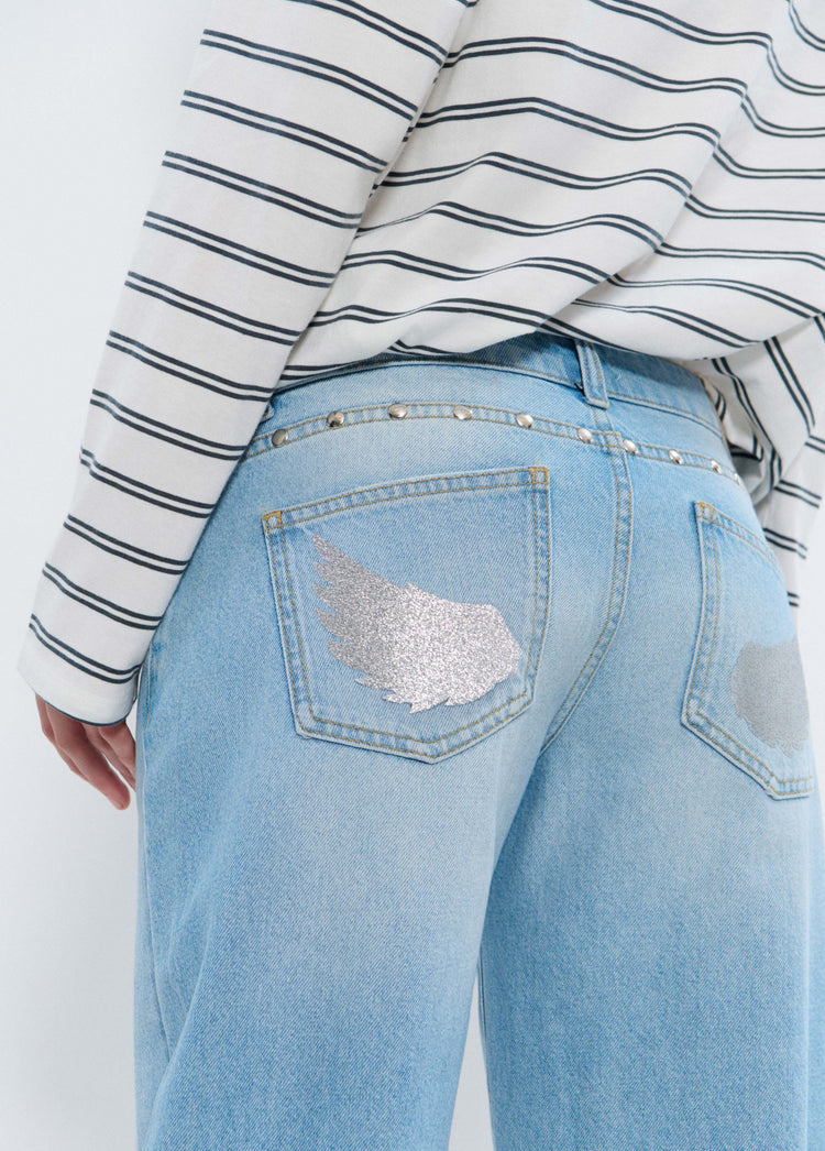 Jeans met lage taille en glittervleugels