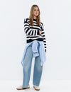 Braided striped sweater with embroidered dog