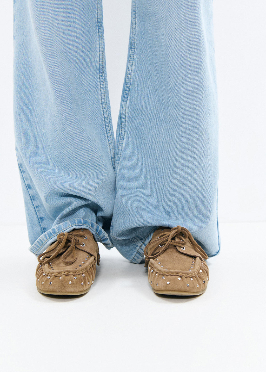 Mocassins de cuir amb serrells