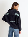 Sudadera capucha tachas