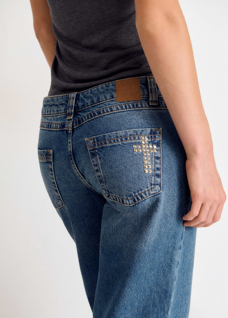 Cross-studded jeans
