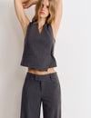 Wrap vest with toggle fastenings