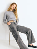 Jeans met studs en borduurwerk in de tailleband