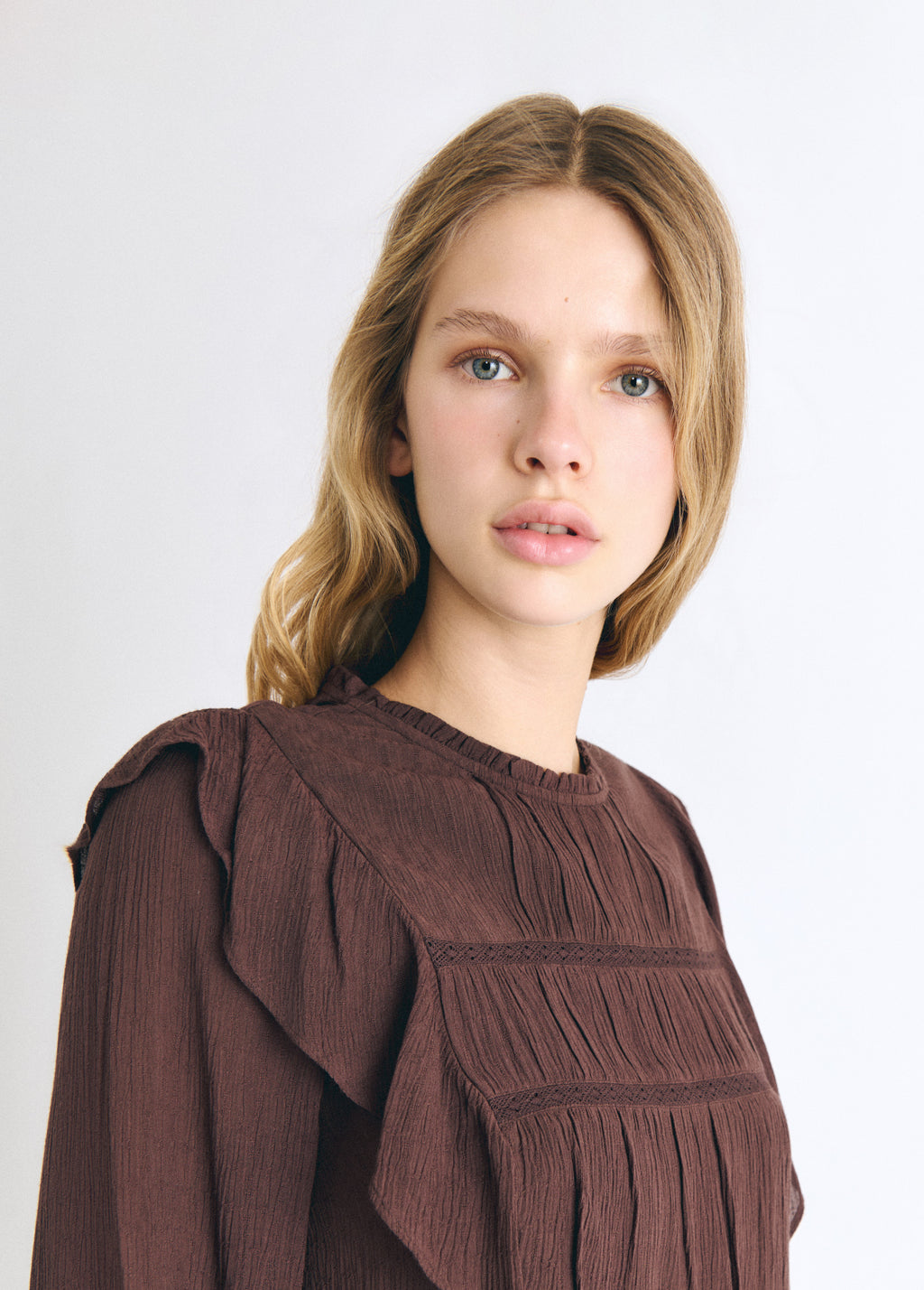 Box neck blouse with ruffles