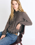 Bluse mit Karomuster und besticktem Saum