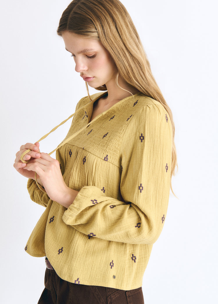 Embroidered smocked blouse
