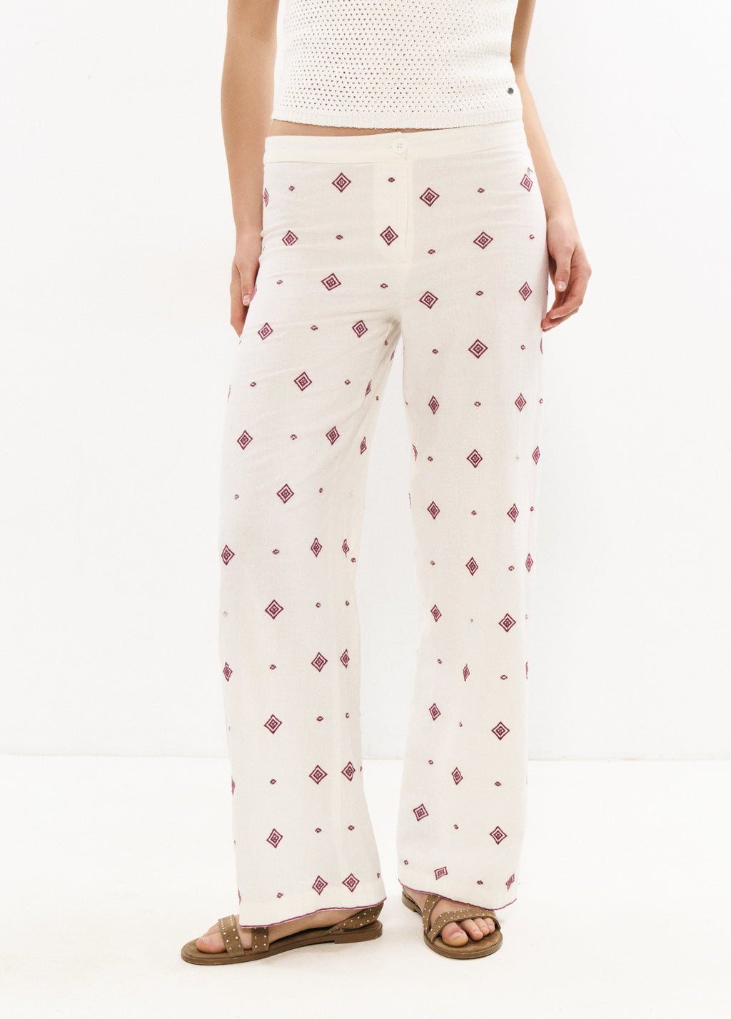 Long pants with embroidered border