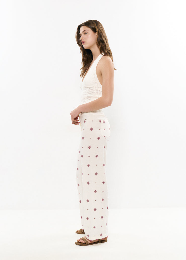 Lange broek met geborduurde bies