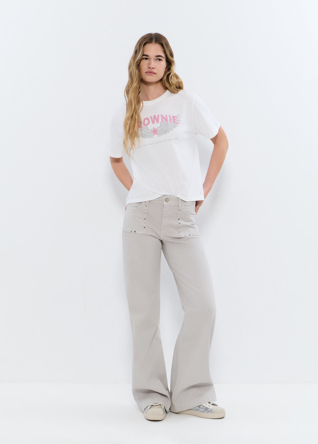 Pantaloni dritti con borchie